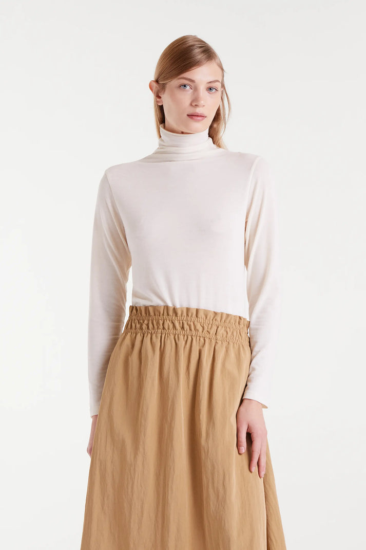 Camiseta cuello alto blanco - Compañía Fantástica Camiseta cuello alto blanco - Compañía Fantástica