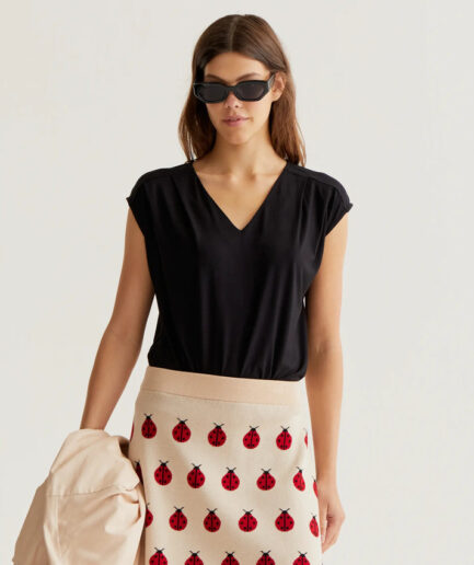 Camiseta negra manga sisa - Compañía Fantástica