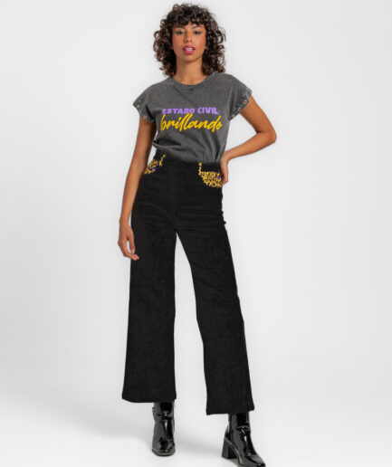 Pantalón jeans tiro alto pernera ancha - Lolina. BRILLANDO